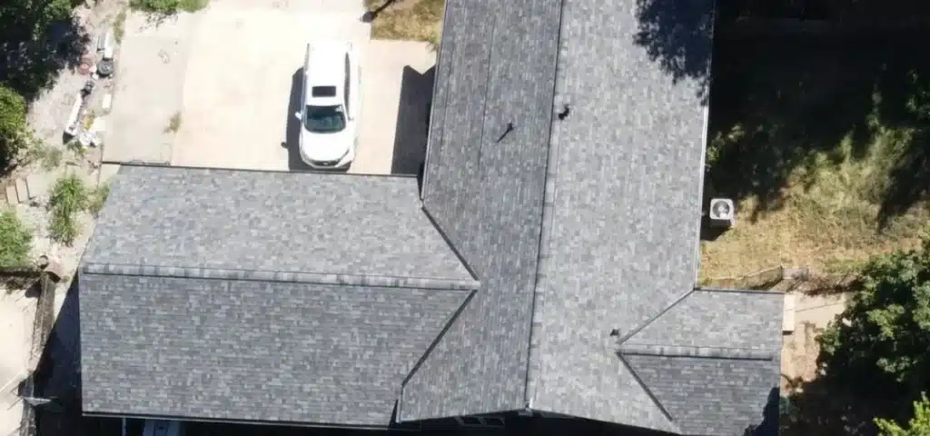 A new roof being installed on a Kansas City home for enhanced protection and curb appeal.